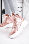 Dámske športové topánky izolované ružové zlaté davan