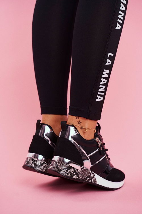 Dámska športová topánka čierna postava