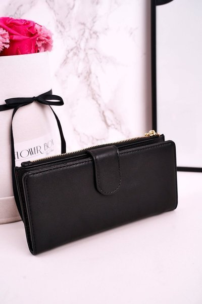 Veľká dámska peňaženka s ďalšou kabelkou a čiernymi strapcami