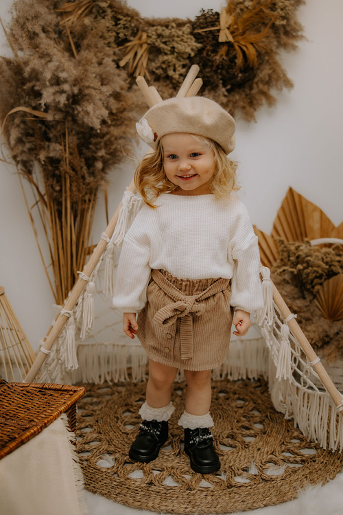 Detské topánky izolované čiernou flosse