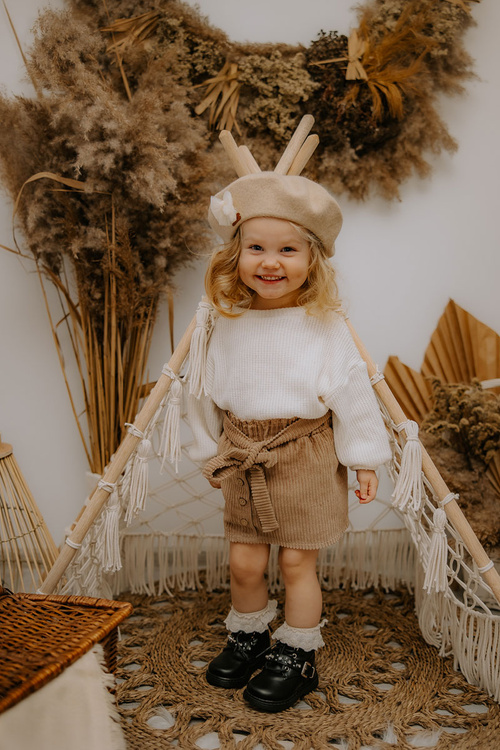 Detské topánky izolované čiernou flosse