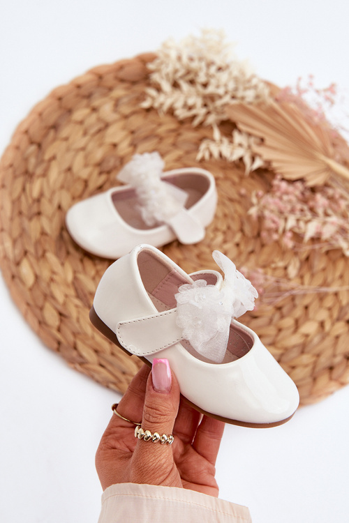 Lakýrované dětské baletky na suchý zip s mašlí Bílé Olessa