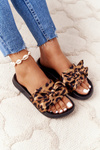 Ženské flip -flops s luk leopardom to porazili