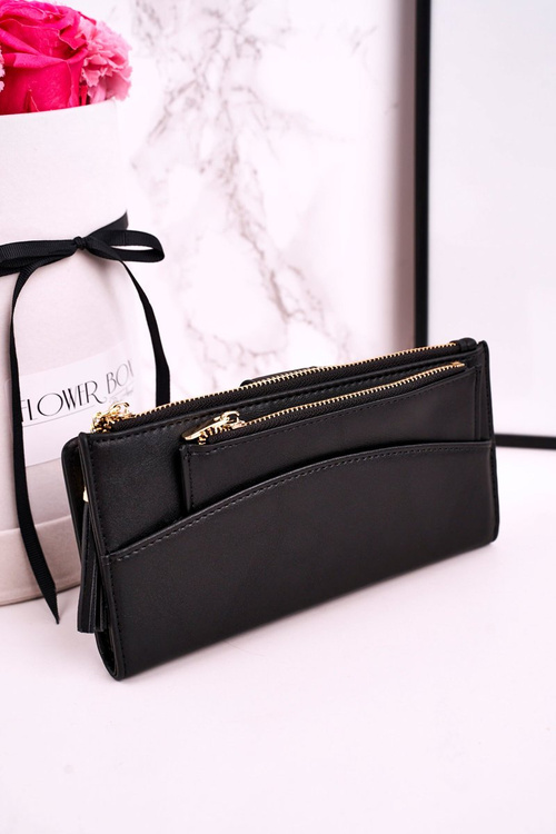 Veľká dámska peňaženka s ďalšou kabelkou a čiernymi strapcami