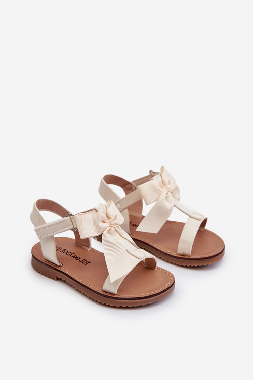 Lakované dětské sandálky s mašlí na suchý zip světle béžové Joratia