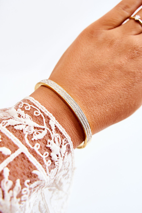 Dámsky oceľový náramok s dekoratívnymi zlatými zirkónmi