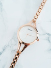 Dámske hodinky Ernest na náramku ružové zlato elegantné