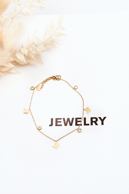 Náramok na nohu so zlatými motýľmi